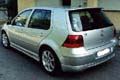 Minigonne, sottoparaurti, spoiler posteriore Lester, antenna Simoni Racing, dischi in lega OZ, cliccare per ingrandire