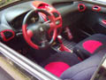 Cornice, cuffia, pomello Simoni Racing, estintore da un chilo, tappetini in alluminio mandorlato ICC, pedali Simoni Racing, coprivolante isotta, cliccare per ingrandire